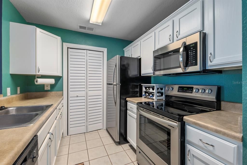 Laundry room entrance through the kitchen.