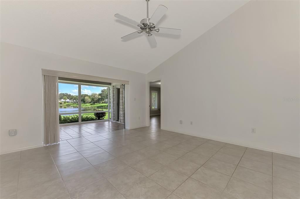 Family Room with access to Primary Bedroom and Enclosed Lanai