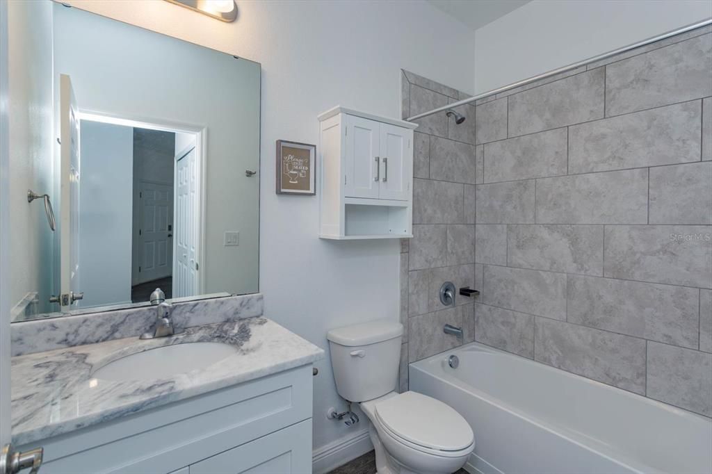 Secondary bathroom with tub/shower combo