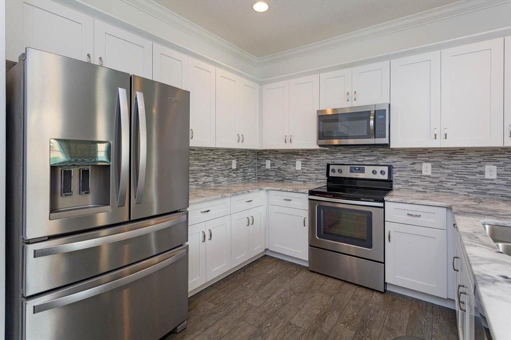 Kitchen with stainless steel appliances