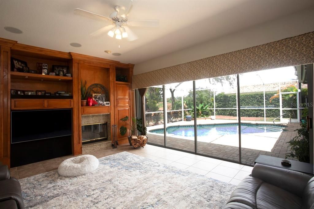 Family Room & Pool view through quadruple glass sliders