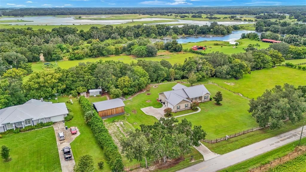 Custom built home on 2 parcels totaling 10.48 acres