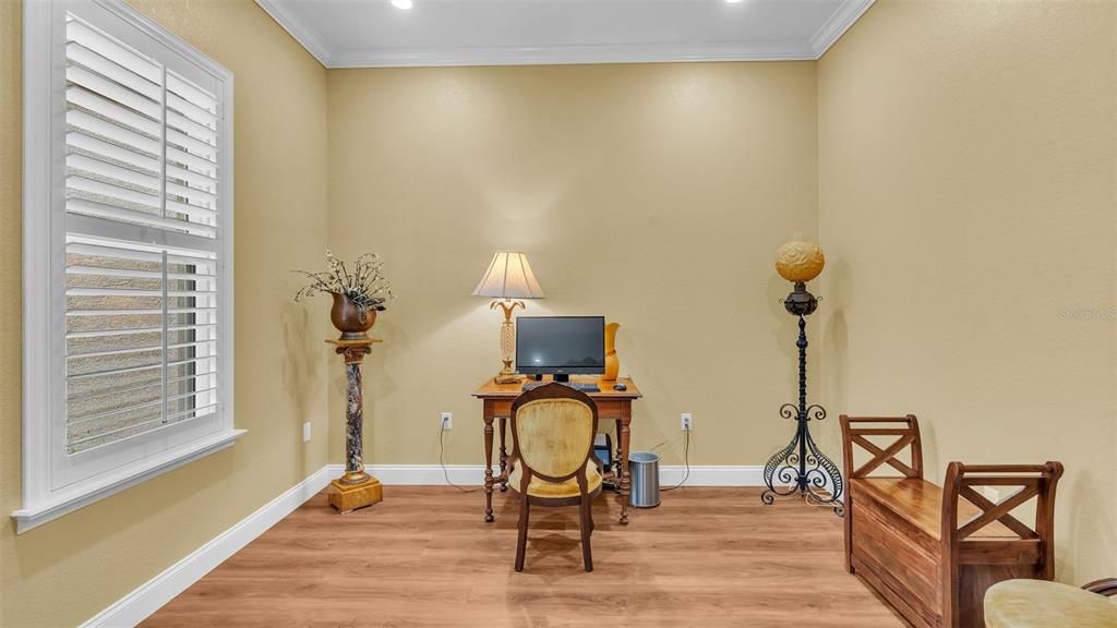 4th room currently used as an office with antique double doors just off the living room