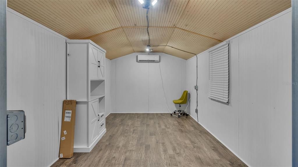 Brand new detached shed with electricity and AC! Perfect for guest house, home office, gym, playhouse, storage, and more