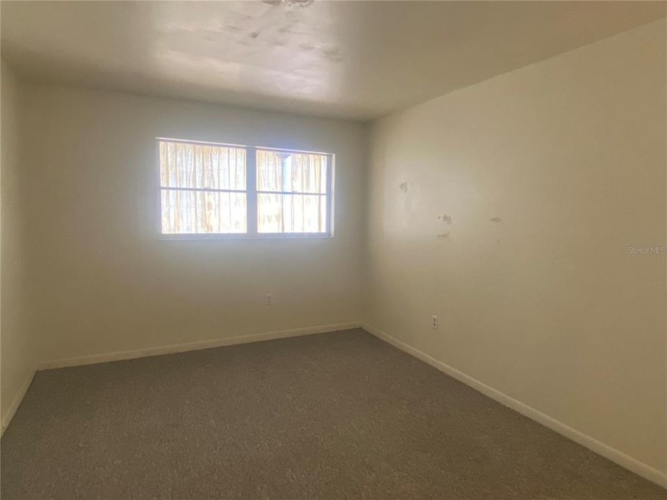 Bedroom - here is the view towards the windows looking in the Florida room ( behind you is the closet)