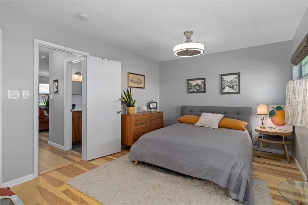 The bedroom features dual built in closets.