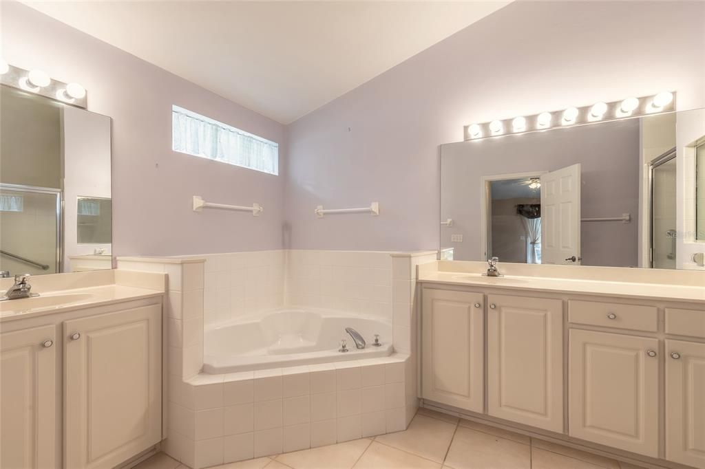 With ensuite...two vanities...garden tub