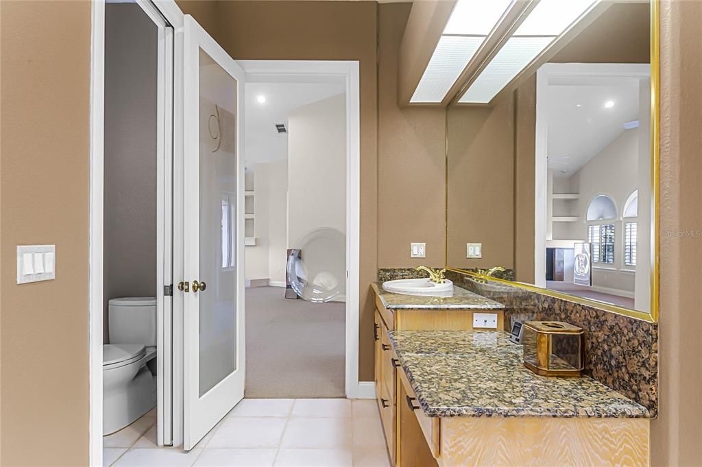 Primary Bathroom with large walk-in closet