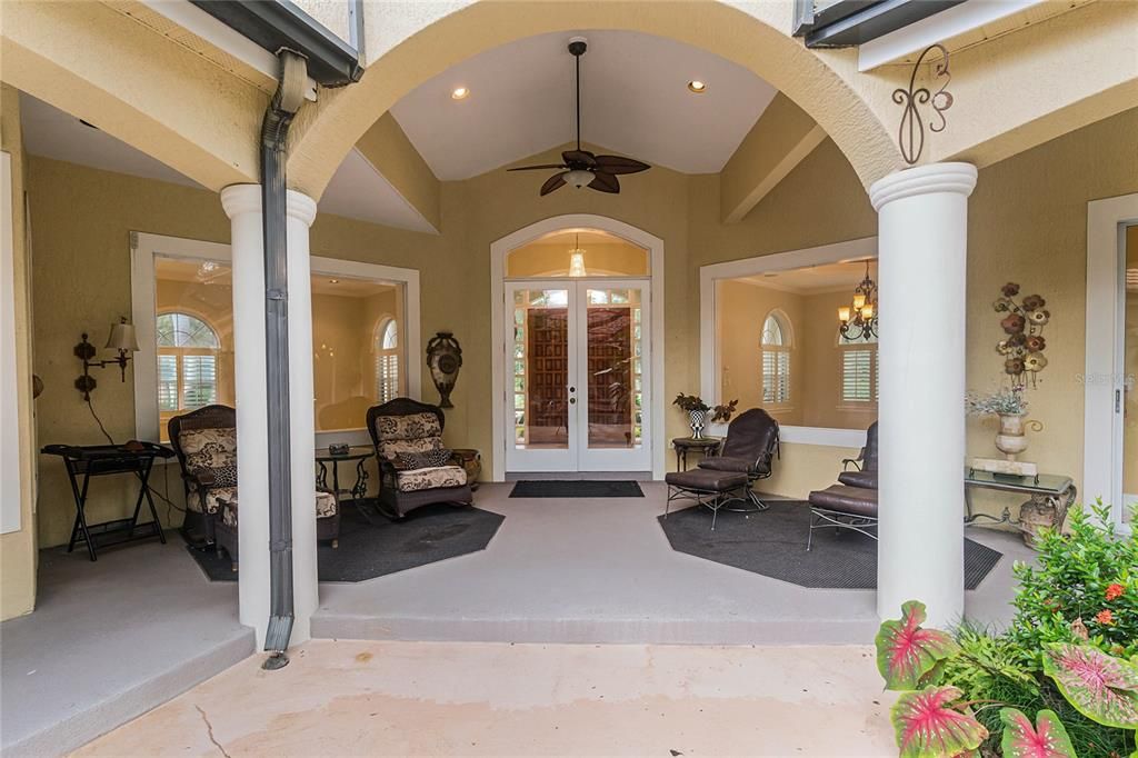 View from the Courtyard into the house front doors.