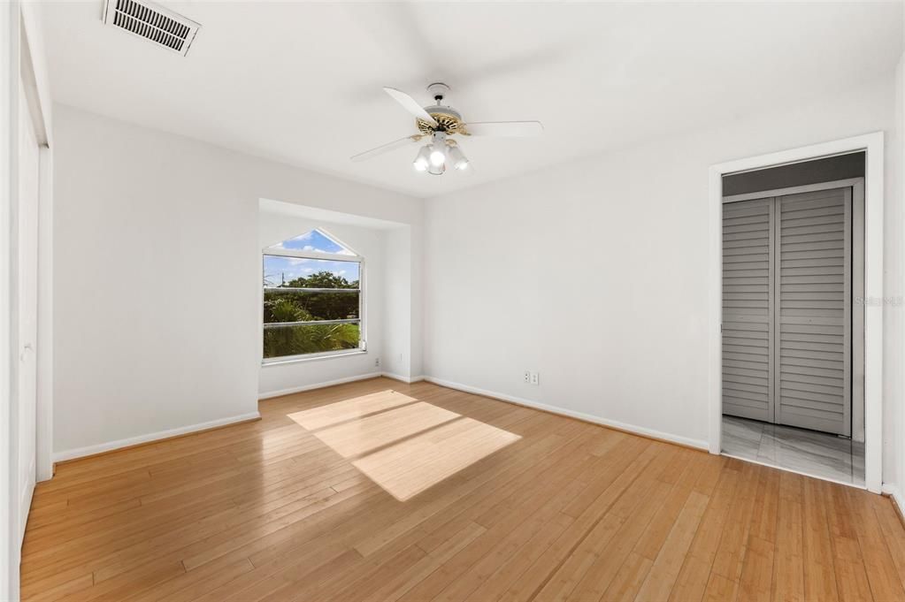 Upstairs bedroom with balcony and en suite bath