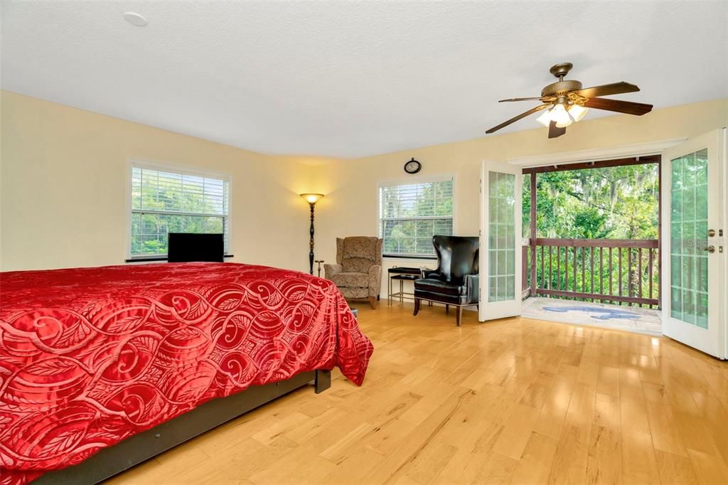 Primary bedroom with balcony