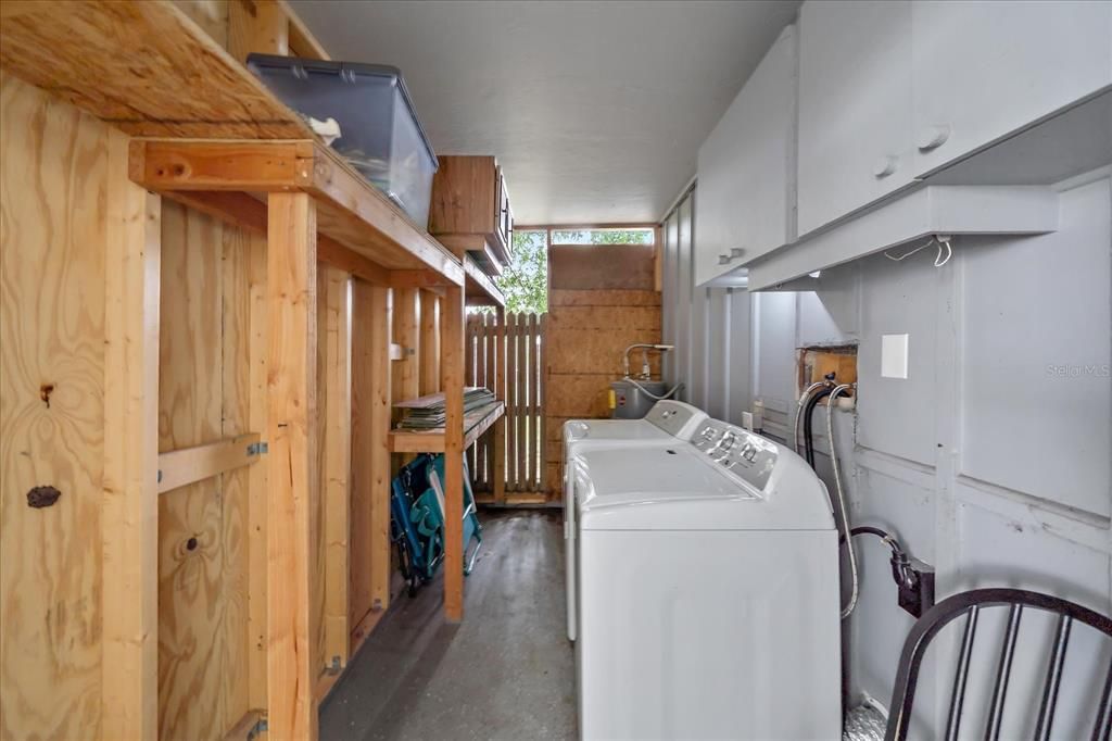 shared laundry room in carport