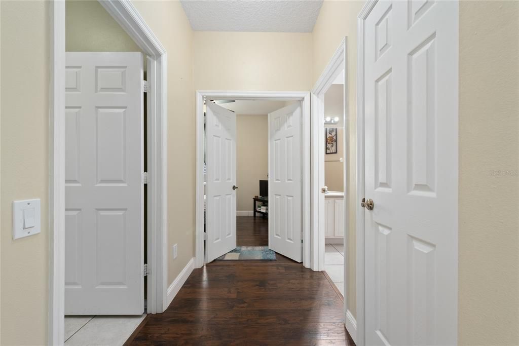 Third bedroom at the back,full bathroom to the right and laundry room to the left