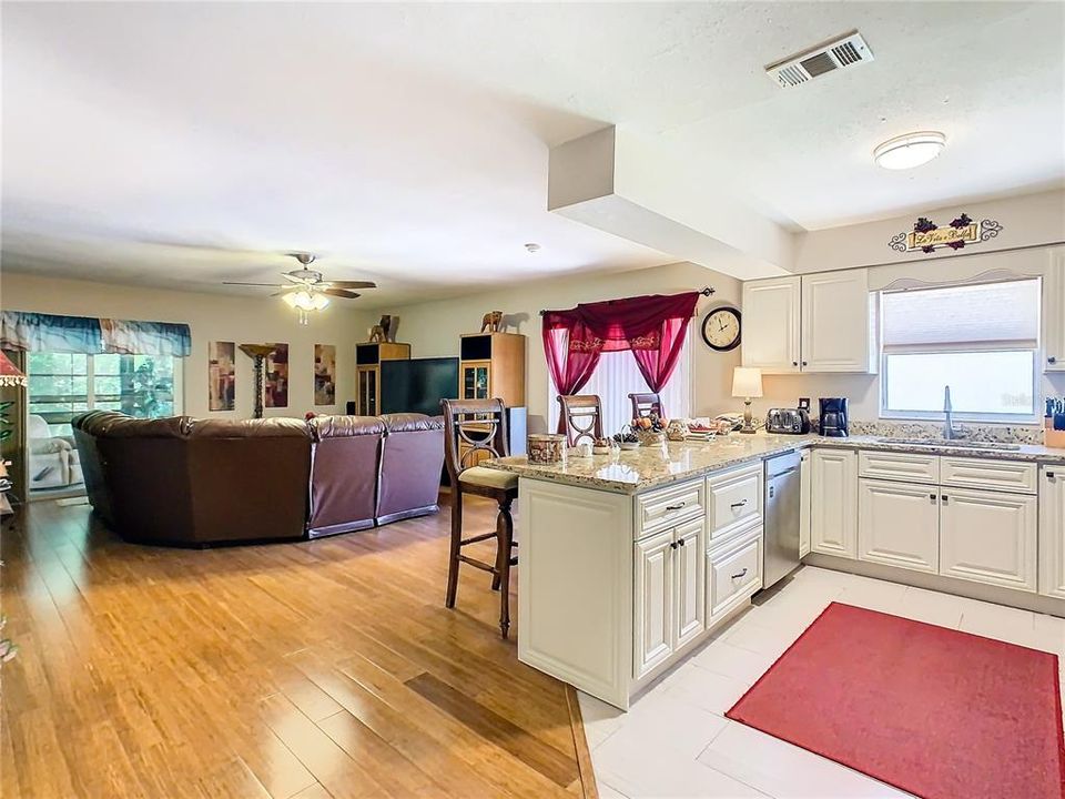 Kitchen and view into the family room