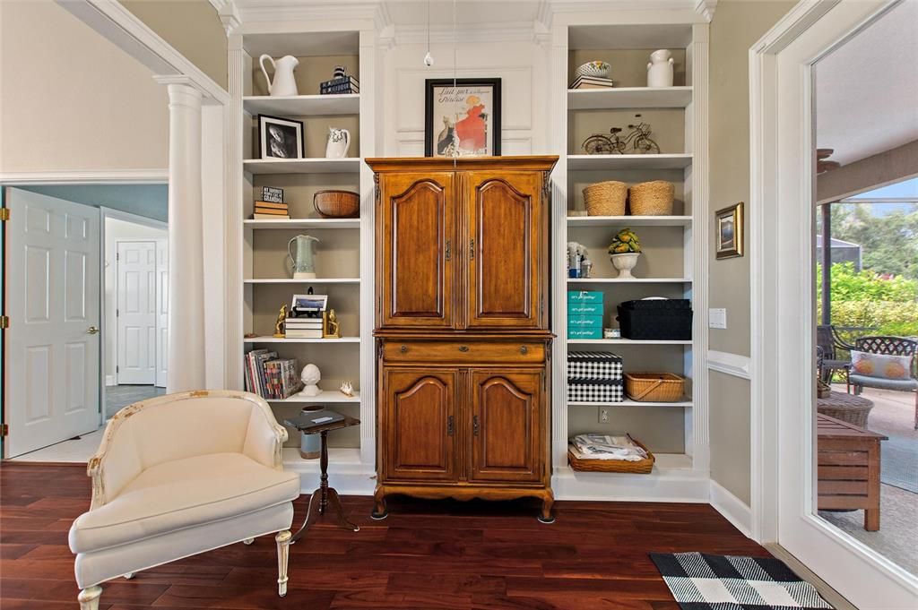 Floor to ceiling bookcases in Den