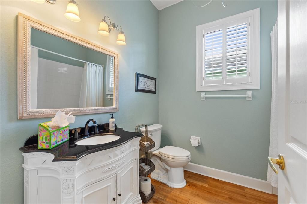 Granite topped vanity in Guest bathroom