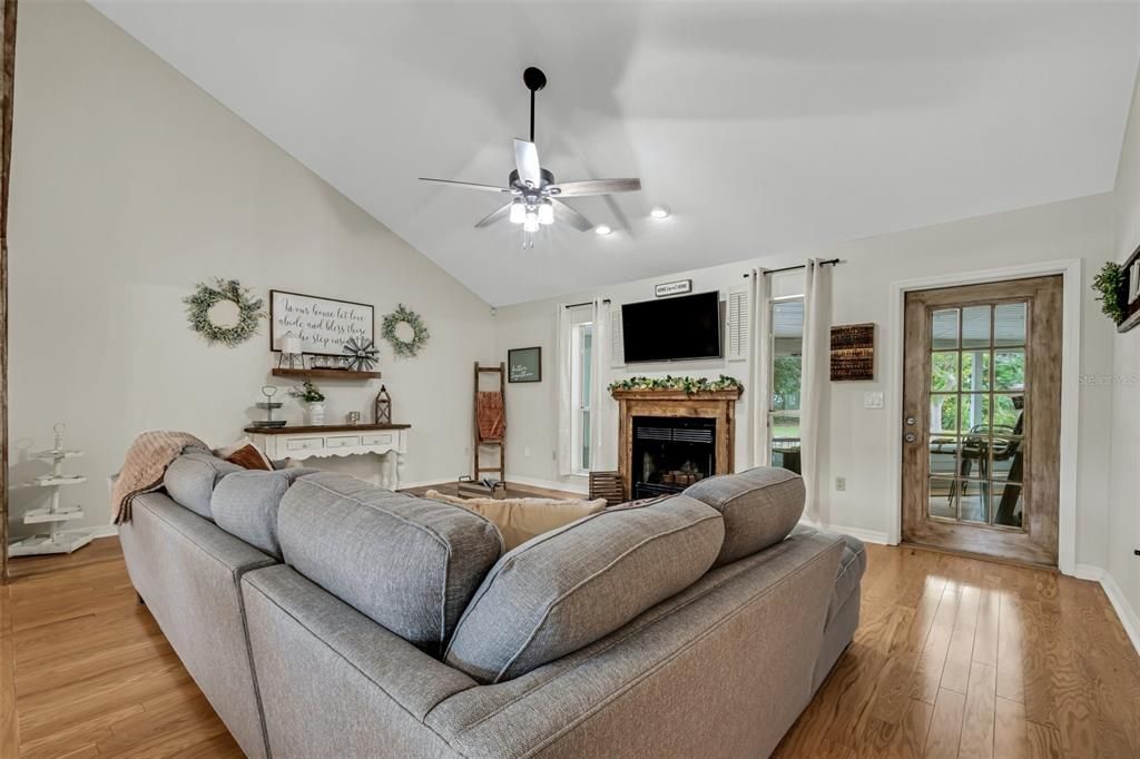 The family room is spacious and features a set of charming built-ins.