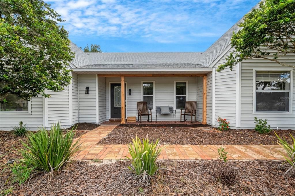 This charming front porch awaits is new family!