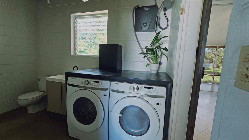 Laundry room. Half bath.