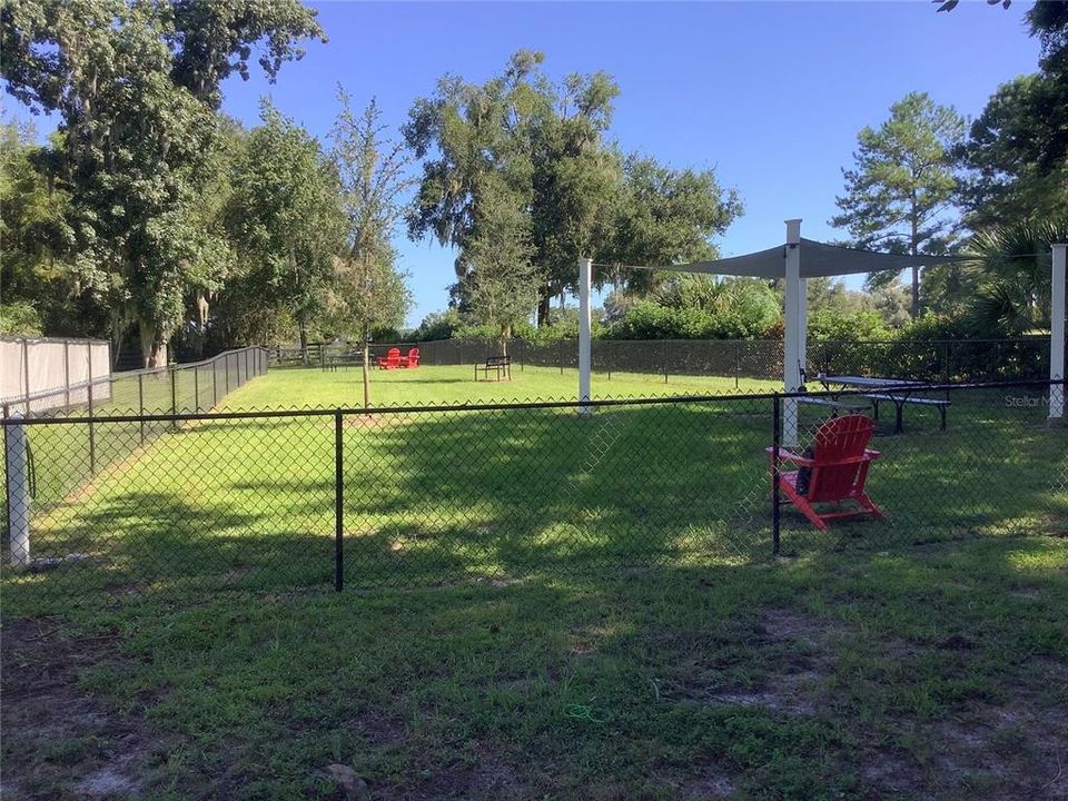 Dog park with shaded area.