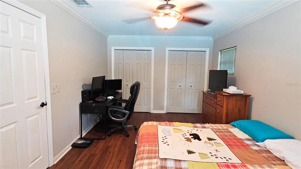 Bedroom 4 with dual closets