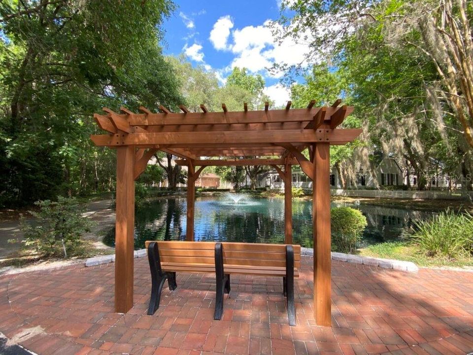 Relaxing Koi Pond and benches along walking trails.