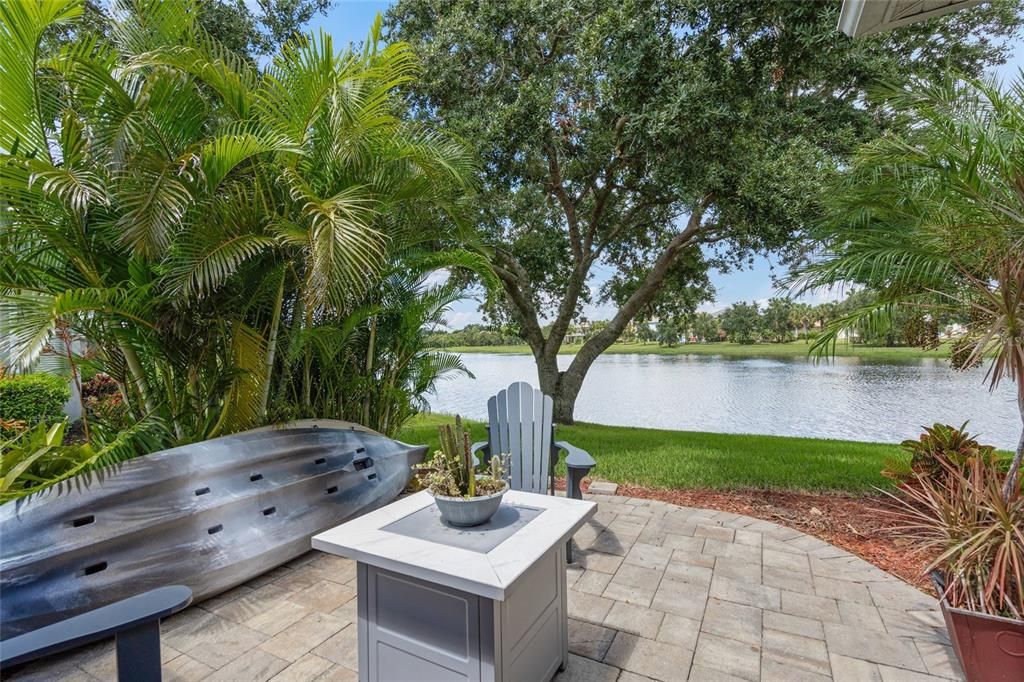 Notice the kayak on the lanai near the firepit.  Residents can enjoy placing a canoe or kayak on the lake and enjoy a little fishing time