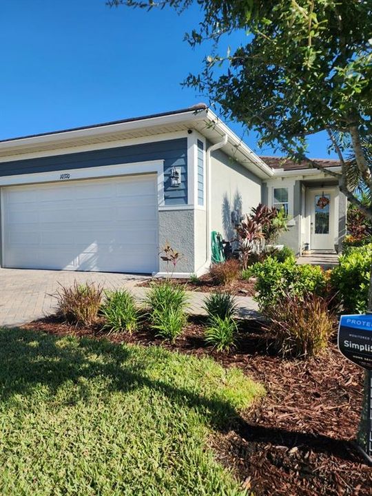 BEAUTIFULLY LANDSCAPED FRONT ENTERANCE