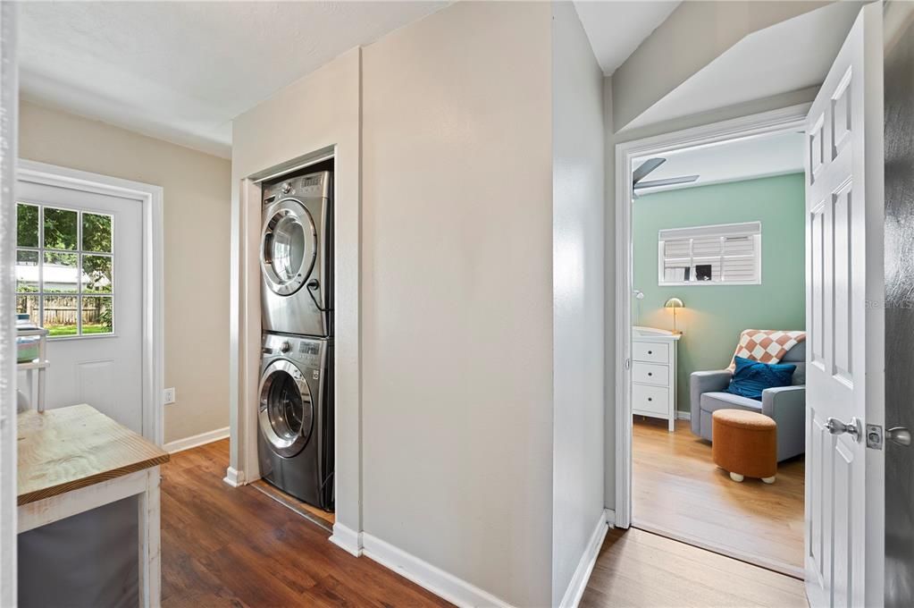 Hallway view of bedroom 2 and laundry