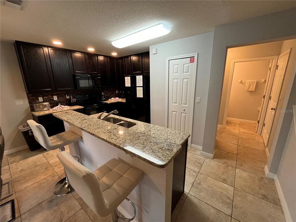 Kitchen bar countertop and stools