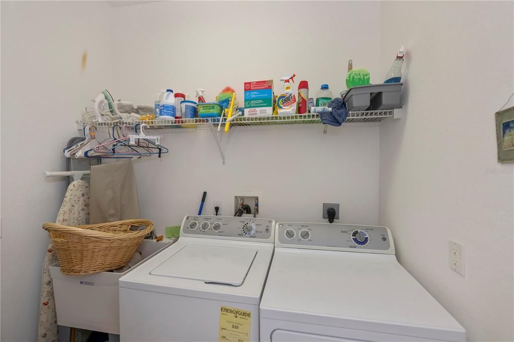 Laundry/utility room is off the main foyer and adjacent to the garage.