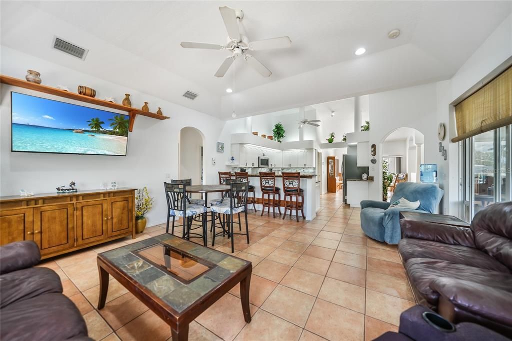 Family Room Opens to the Kitchen.  Sliders to the Lanai