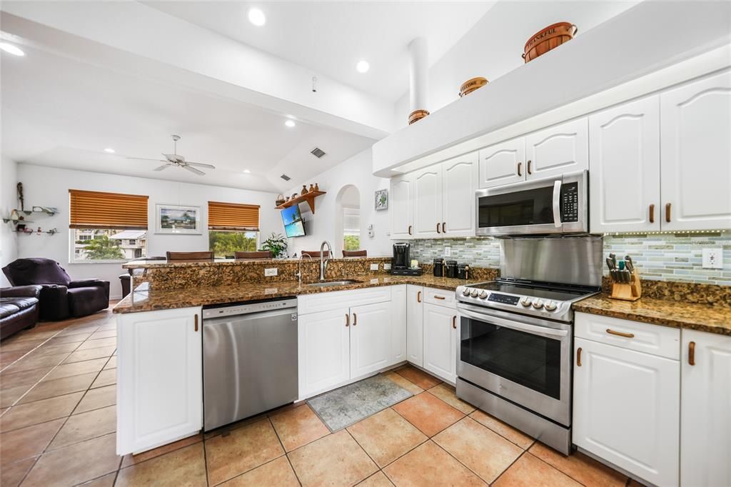 Kitchen with Granite Countertops, Stainless Appliances, Pantry