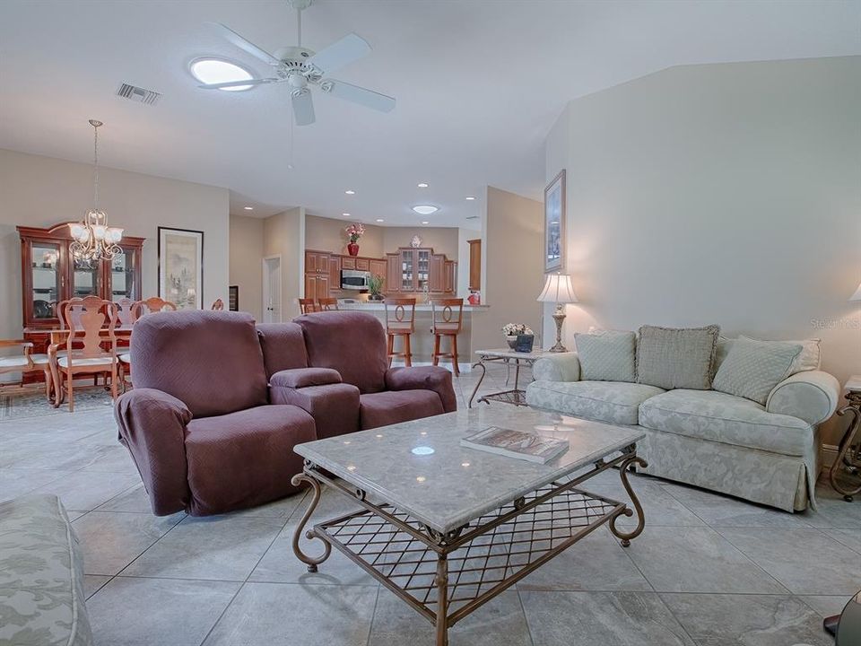 LIVING ROOM WITH SOLAR TUBE FOR EXTRA LIGHTING.