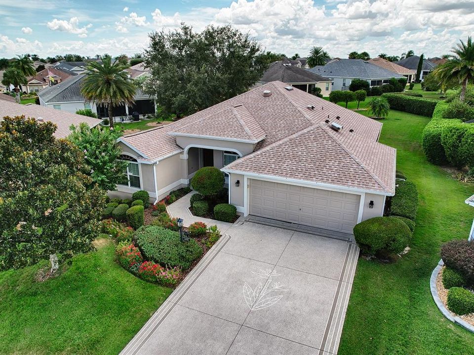 PAINTED DRIVE AND WALKWAY. EXPANDED GARAGE - 24" IN DEPTH - FITS 2 CARS AND GOLF CART.