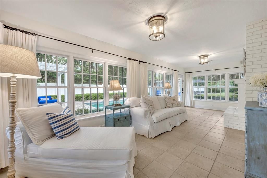 Sunroom wrapped in double pane windows