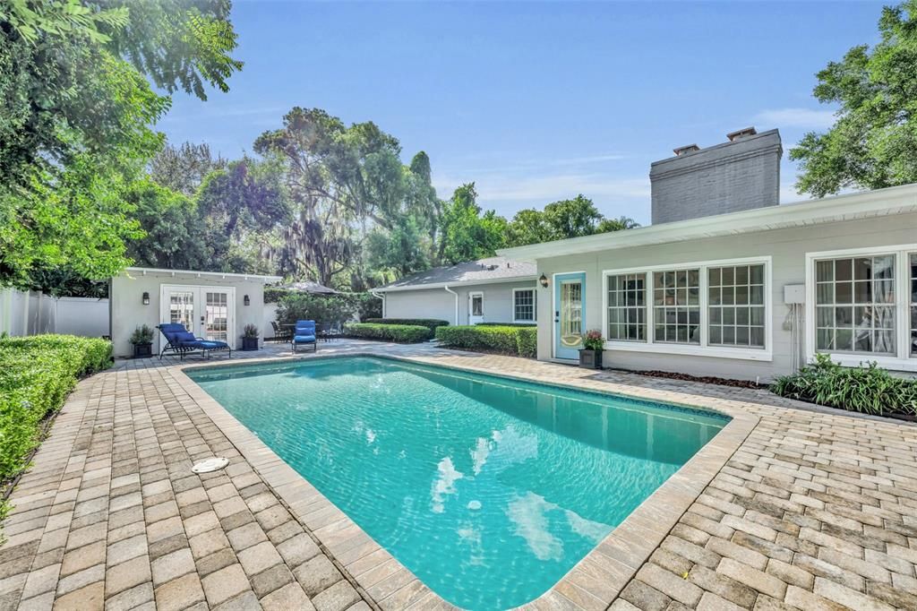 Swimming pool with updated coping and tile