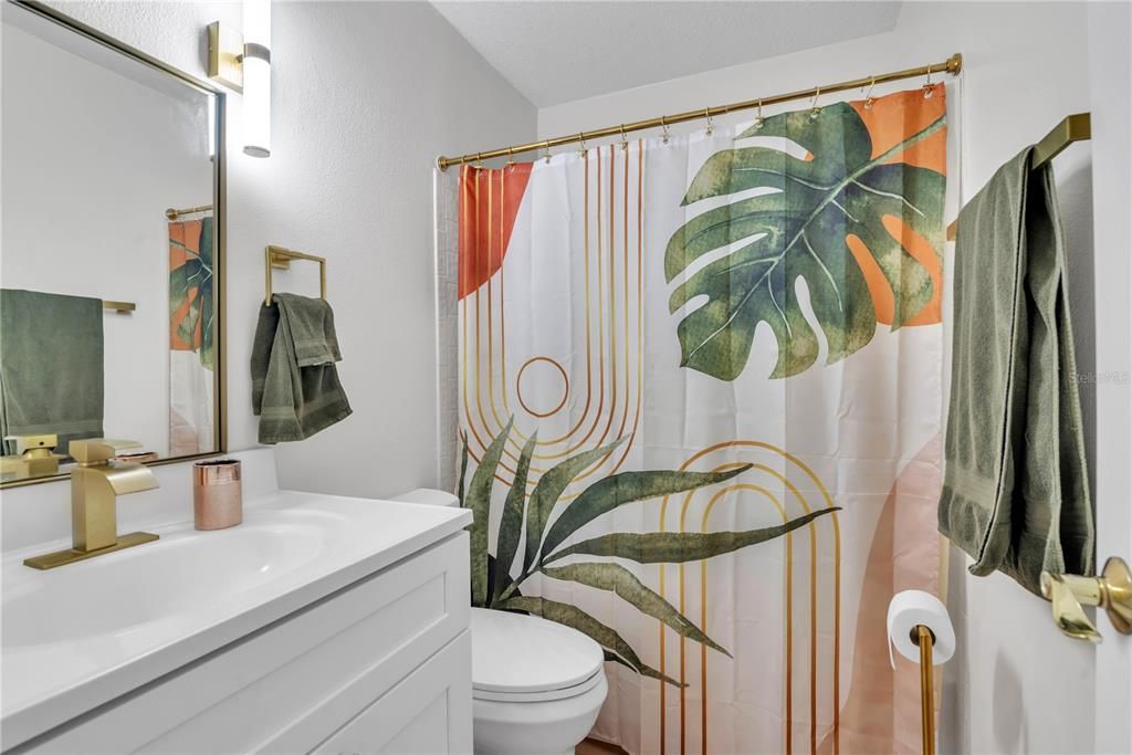 Guest bath with updated vanity and toilet