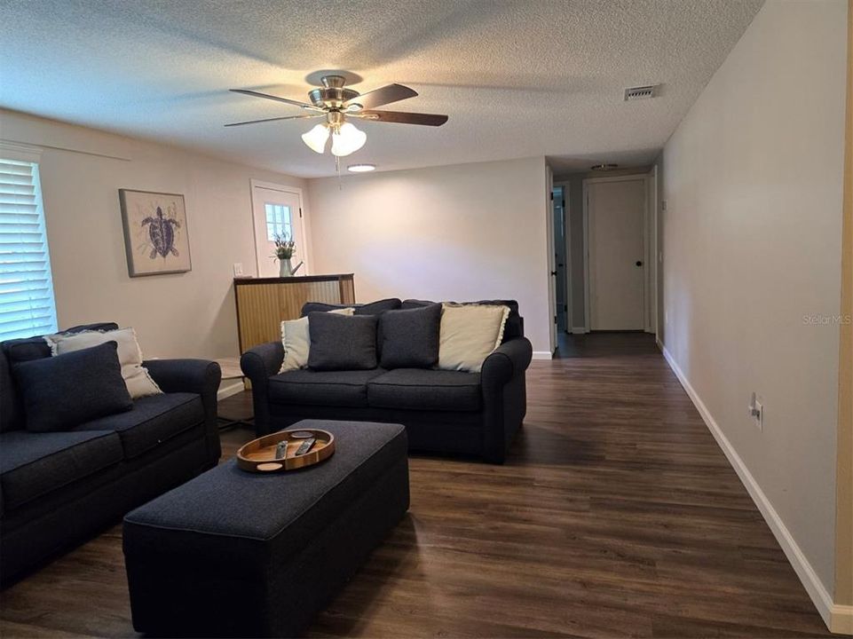 Living Room showing off the new Luxury Vinyl Floors