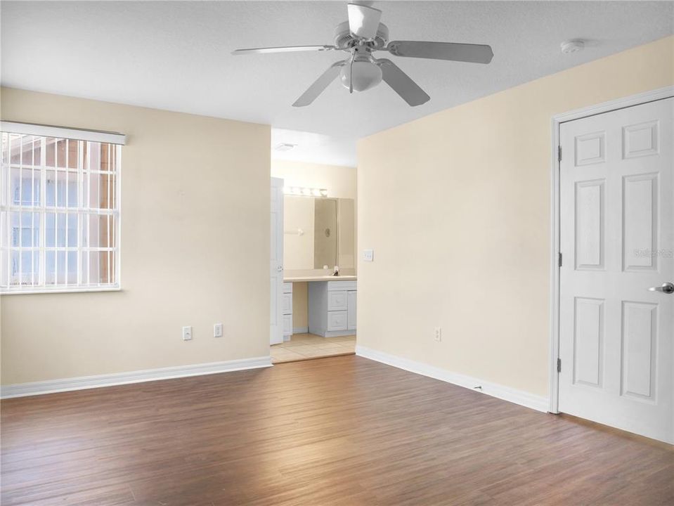 View of the primary bedroom showing the entrance.