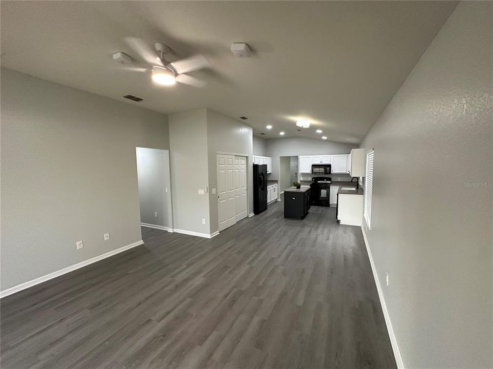 Rear living room and kitchen from sliding glass door