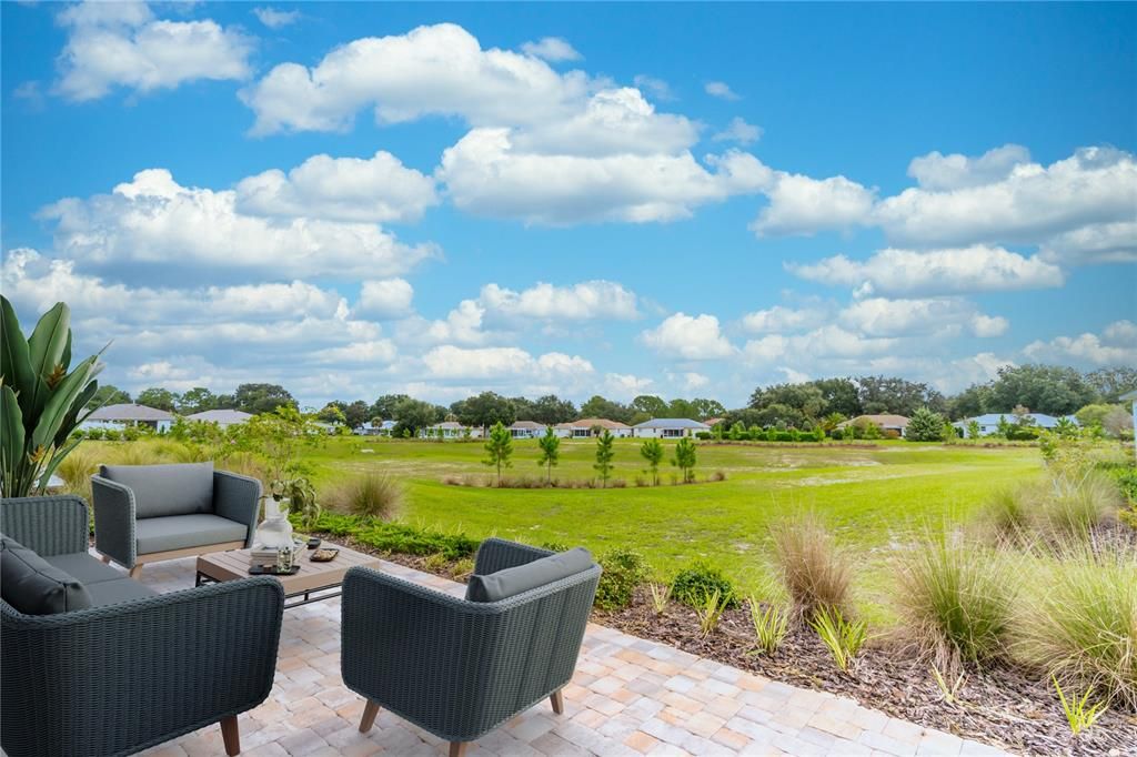 Private lot overlooking retention pond.