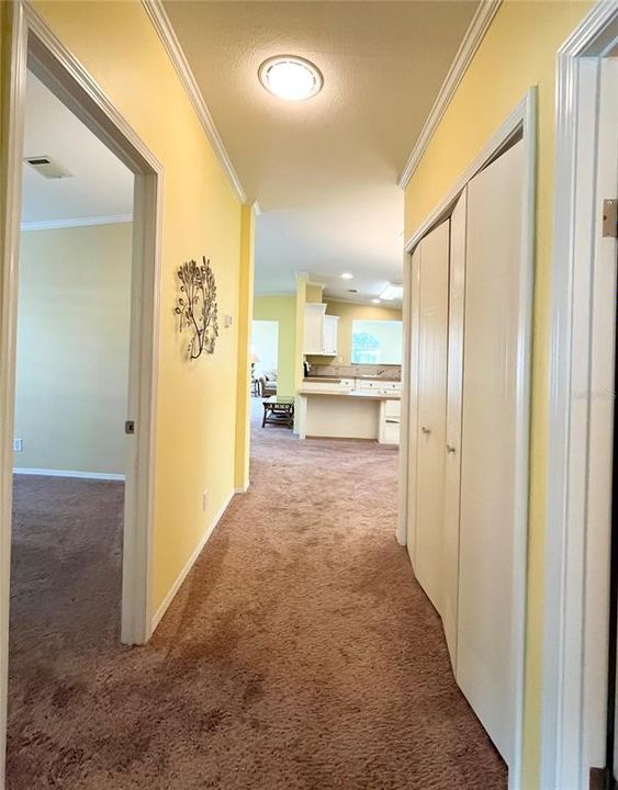 Wide hallway with washer/dryer closet