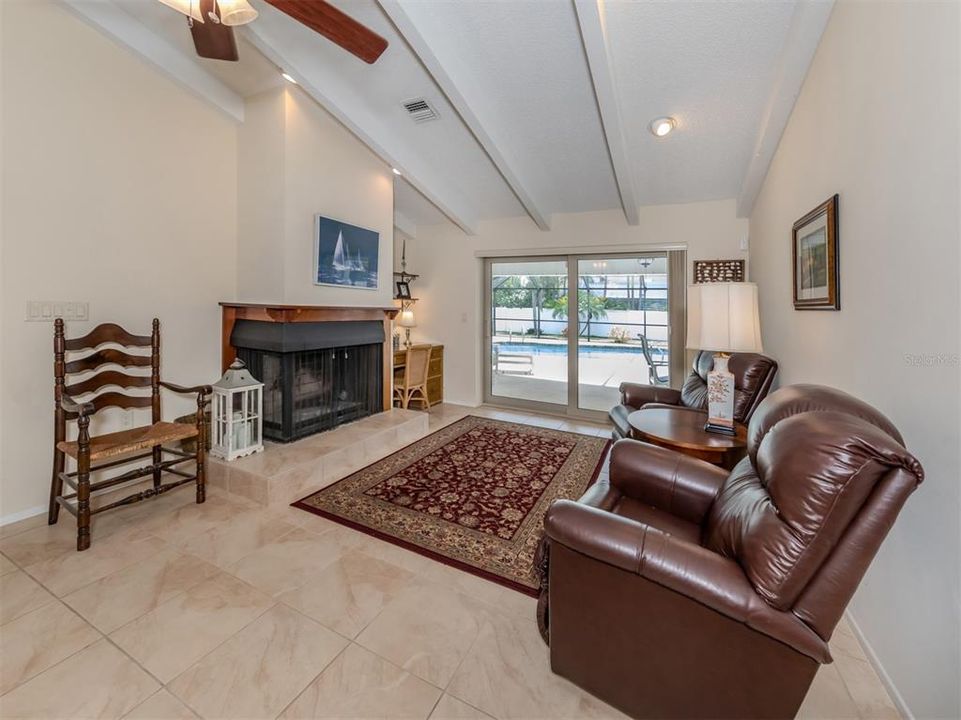 Great room area with wood burning fireplace