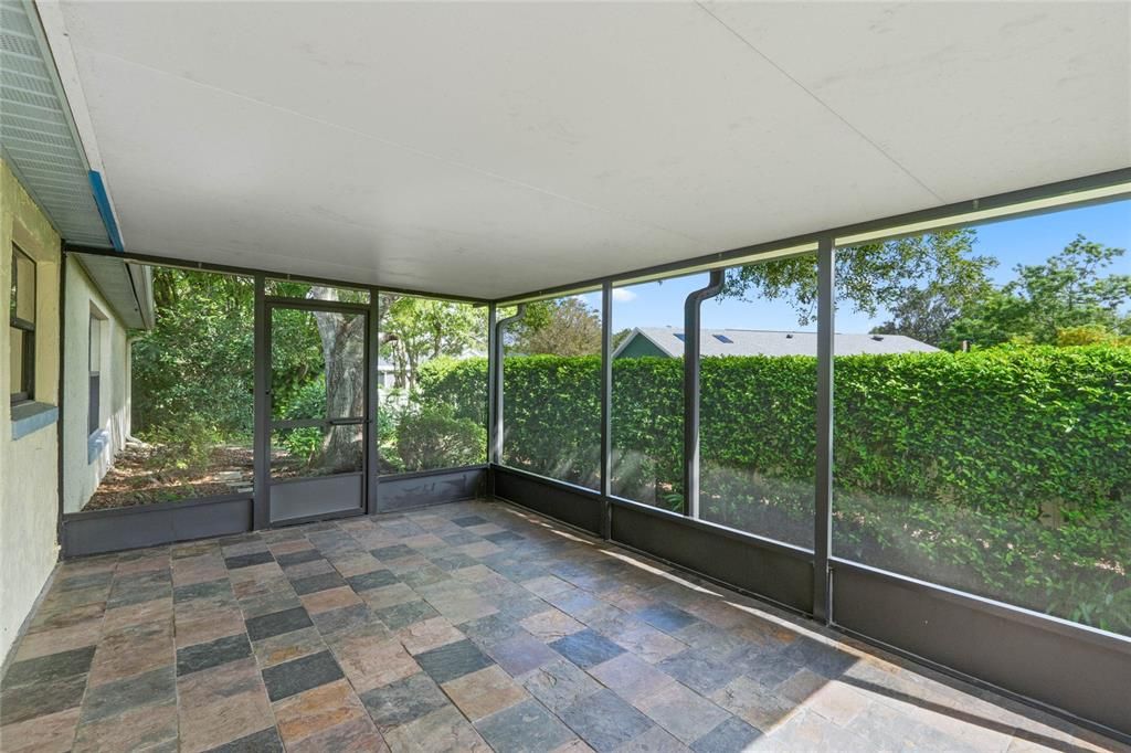 Covered lanai with plenty of space for outdoor furniture