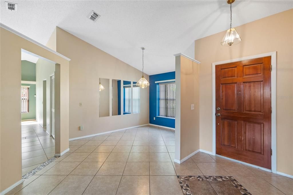 Foyer entry with all tile flooring