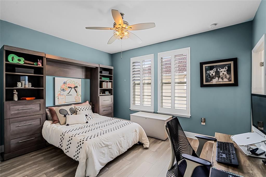 Second bedroom with installed murphy bed