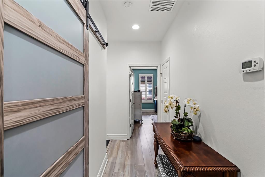 Third floor hallway with added modern barndoor