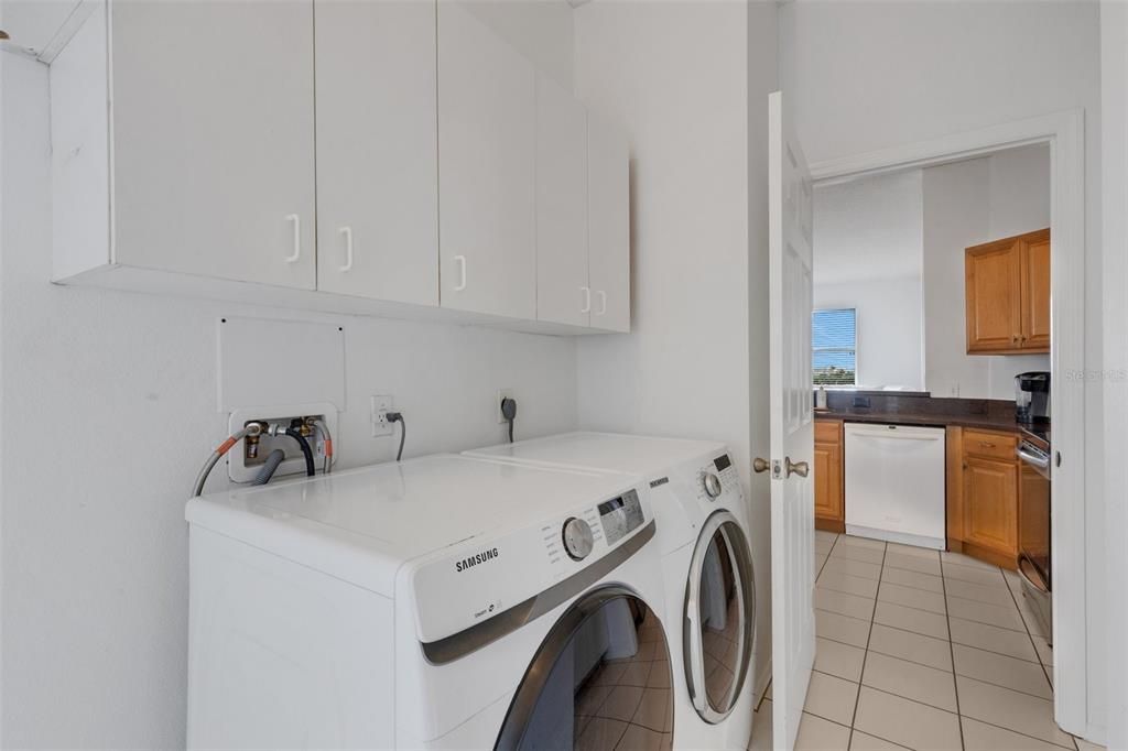 Laundry Appliances looking through pantry and into kitchen