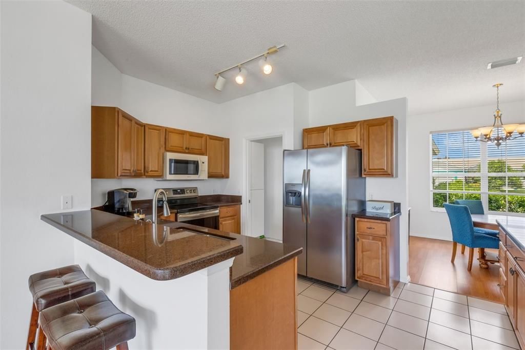 Kitchen as viewed from entry to the family room.